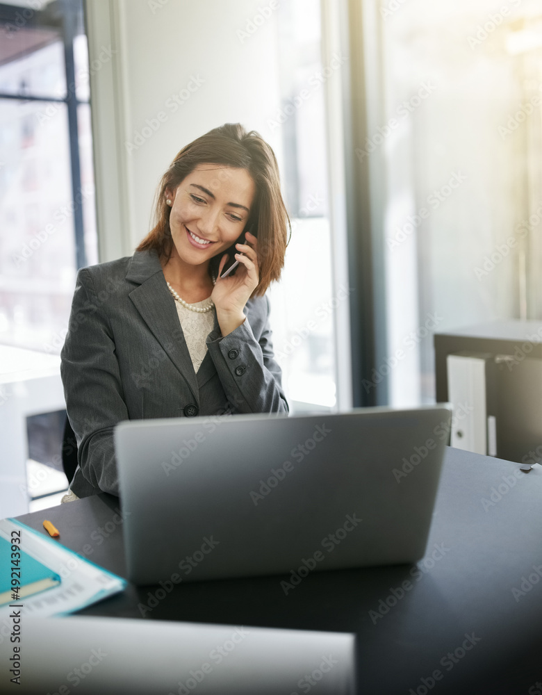 Ive got the contract in front of me. Cropped shot of a businesswoman working in her office.