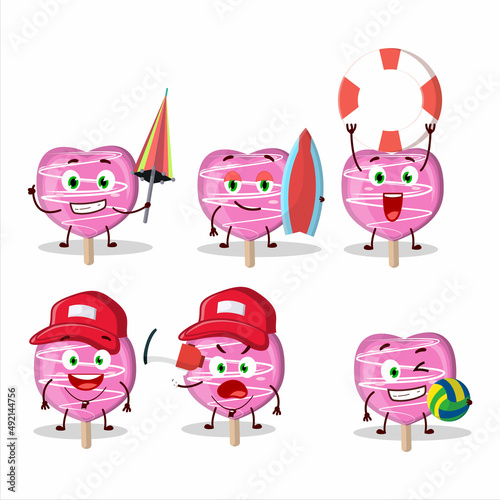Happy Face pink lolipop love cartoon character playing on a beach