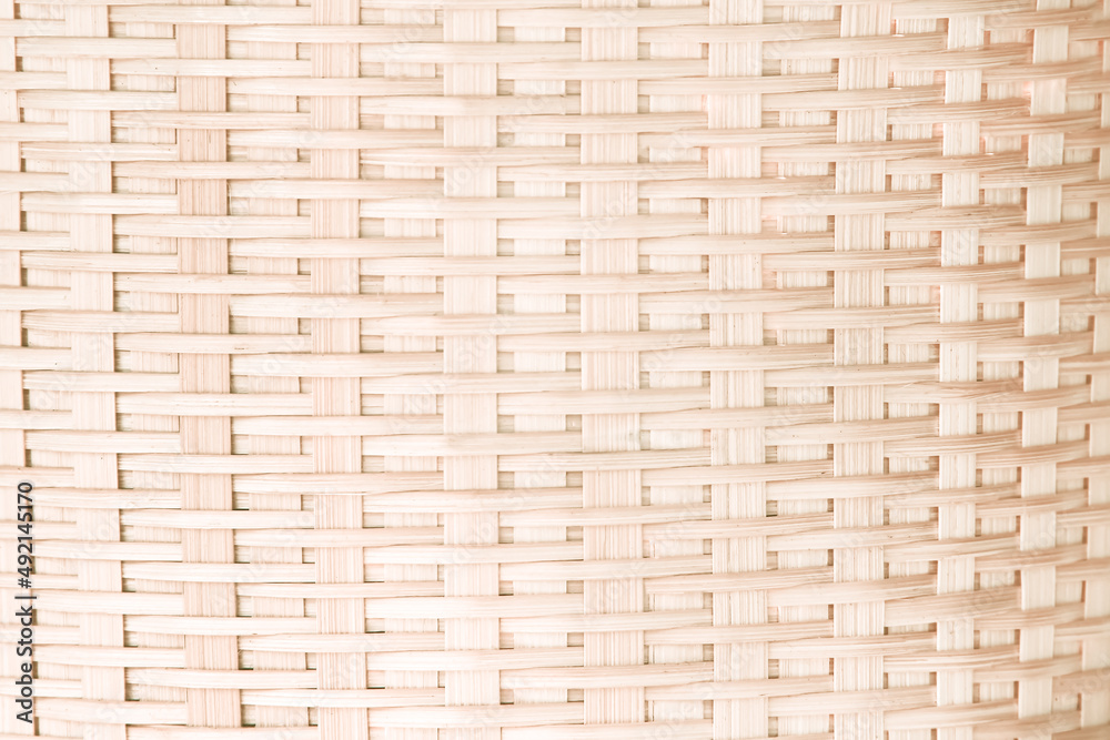 Weaving crafts patterns of bamboo basket brown wood background Weaving crafts patterns of bamboo basket brown wood background