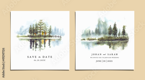 Watercolor wedding invitation with reflection of pine trees in lake