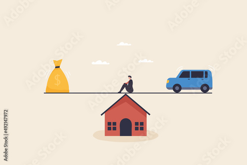 Businessman thinking to loan house and car. Financial and business risk, banking loan and debt risk, stability or balance of economics.