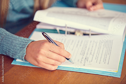 Continual assessment is crucial. Closeup shot of a teacher marking a test.