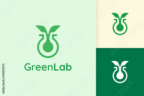 green lab logo with leaf shape for science or chemistry