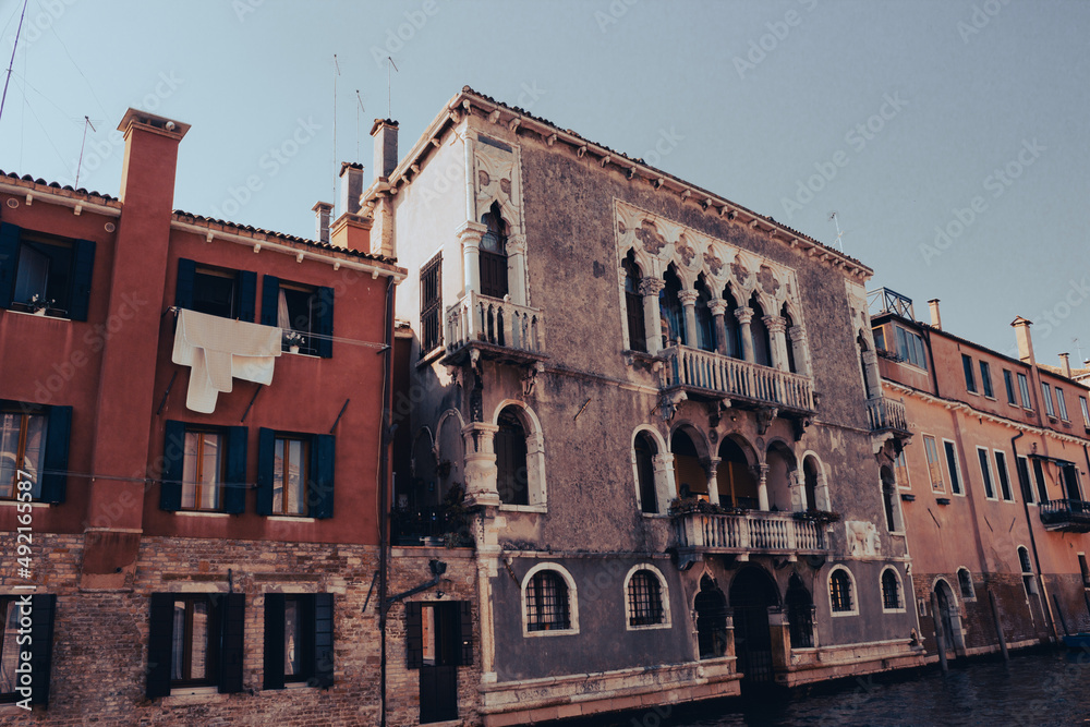 Old Venetian palaces along a small canal.