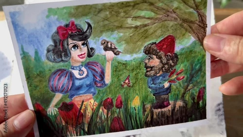 Glossy surface of marker art work on marker paper. Illustration of Snowwhite and dwarf hand drawn using alcohol markers. photo
