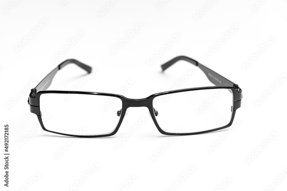 glasses for vision correction in black frame on a white background. advertising of the optics store and ophthalmologist services. fashion accessory. glasses for vision correction in black frame on a white background. advertising of the optics store and ophthalmologist services. fashion accessory.