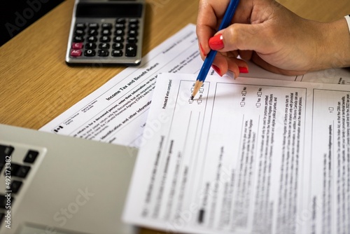 filing out the tax form