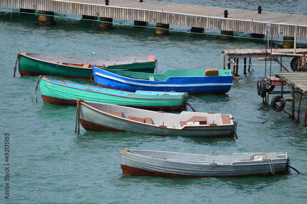 Old wooden docks with boats