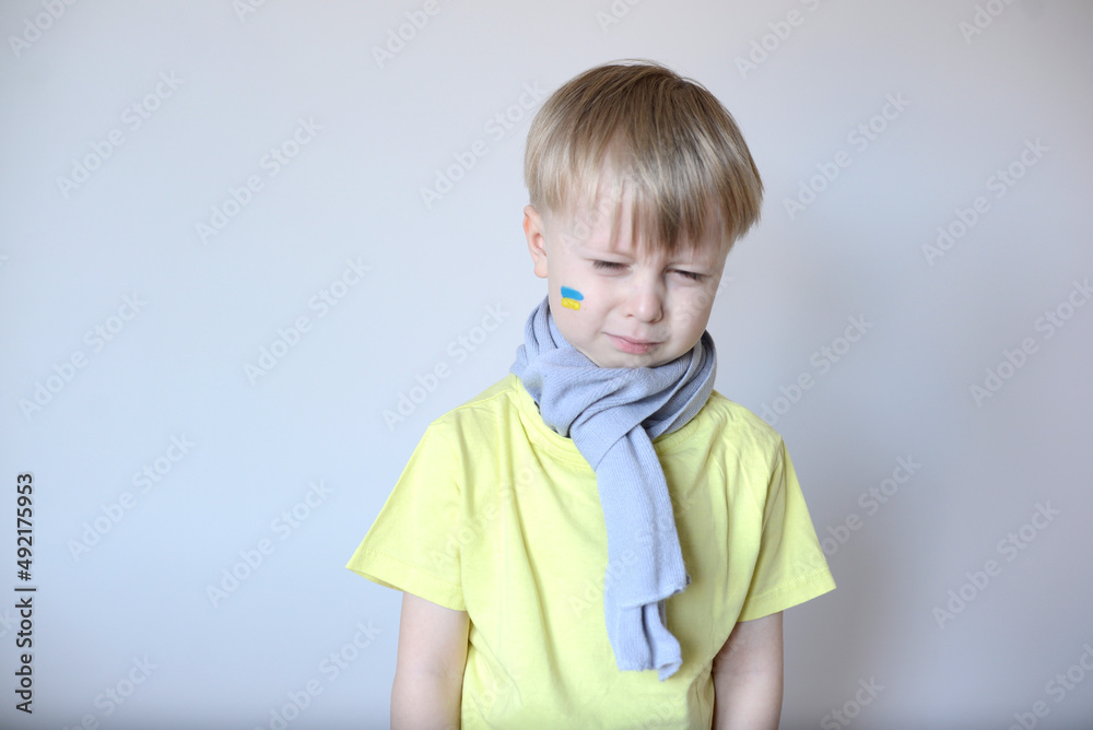A child with the flag of Ukraine A child with the flag of Ukraine