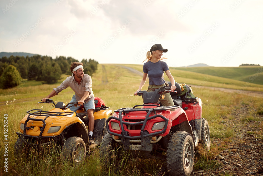 People riding on quad bike.quad bikes on the mountains People riding on quad bike.quad bikes on the mountains