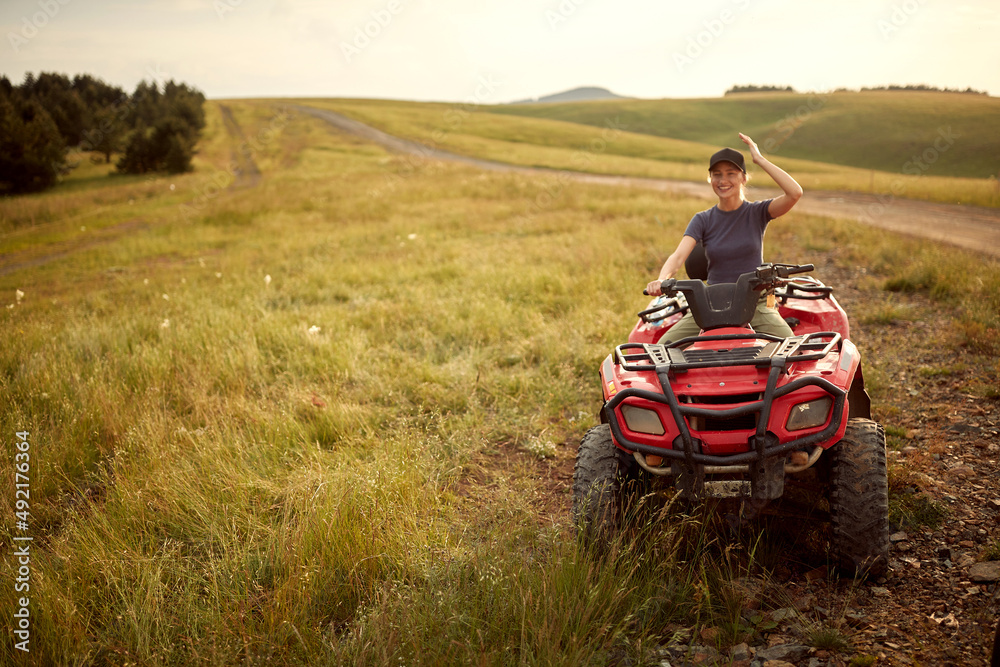 Young  woman enjoying a quad  vehicle