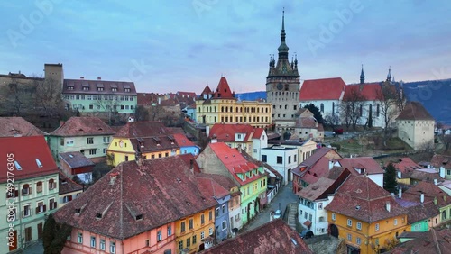 historic medieval town of Sighisoara, aerial view, famous tourist destination in Romania, scenic unesco heritage site in Transylvania in winter
