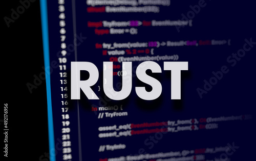 Rust programming language. Rust code on dark background in code editor and word Rust