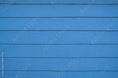 blue wooden background. Old weathered aquamarine board. Texture. Pattern. 