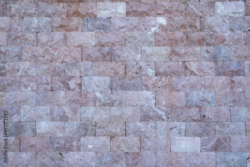 Wallpaper Mural Texture map. Pink Cut stone Wall. Selective Focus. Background. Space for text. Copy space Torontodigital.ca