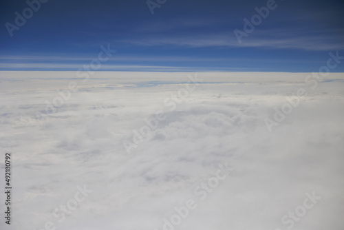 飛行機から見る雲の上の世界 © photok