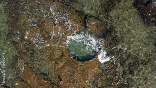 A natural pool is hewn in a natural rock near the shoreline of Haifa, Israel. photo