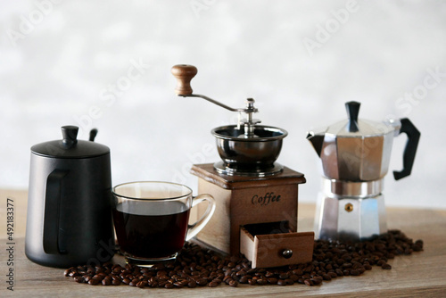 Manual coffee grinder with coffee bean and Drip Kettle Set with Coffee beans