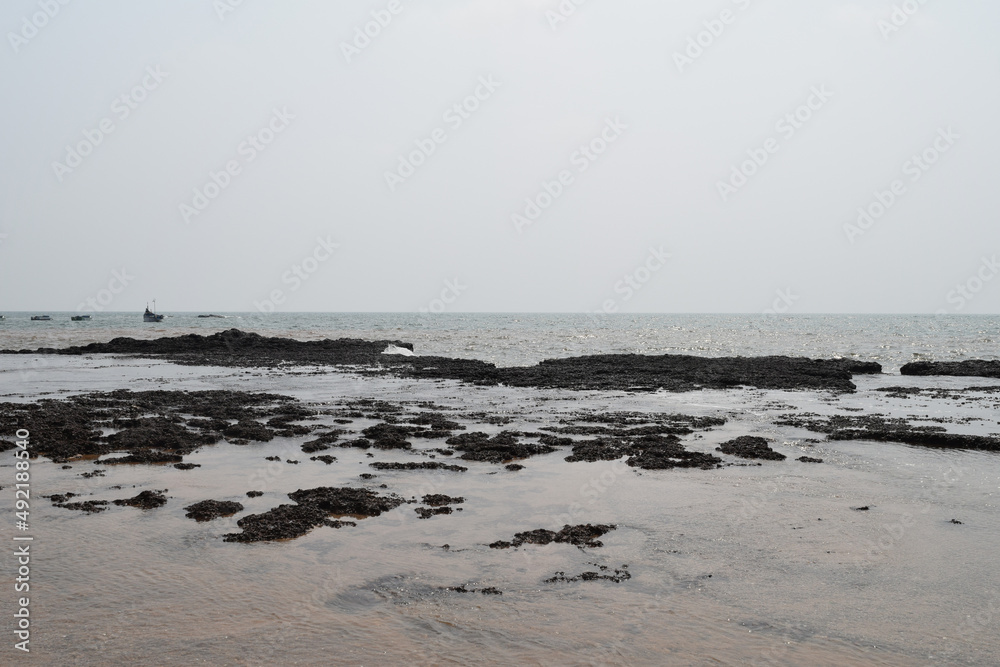 A picture of rocky structures on Anjuna Beach of Goa. 