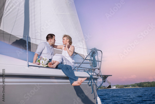 trip on a yacht of a couple in love, a wedding at sea. © velimir