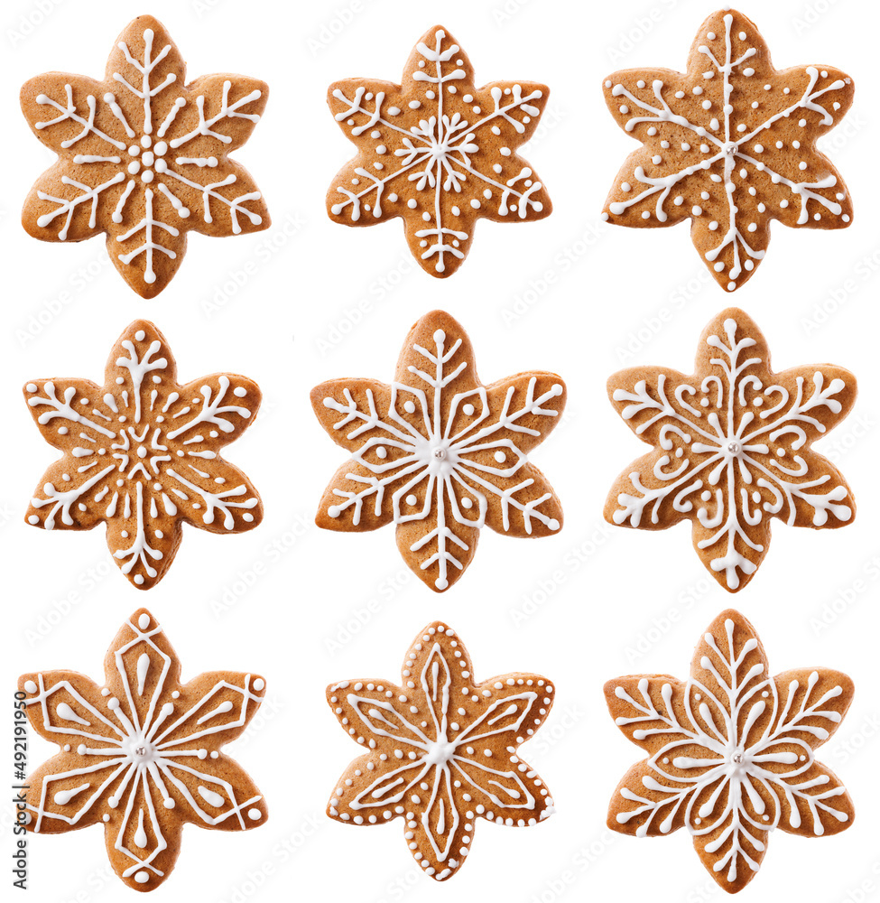 Φωτογραφία A set of gingerbread cookies in the shape of snowflakes or stars
