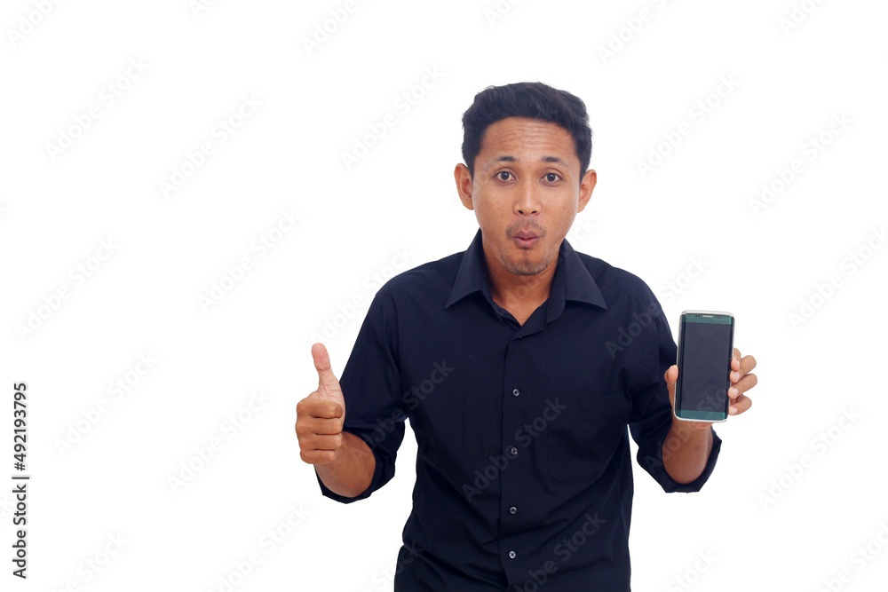 Portrait of a smiling asian man showing blank screen mobile phone with thumbs up Portrait of a smiling asian man showing blank screen mobile phone with thumbs up