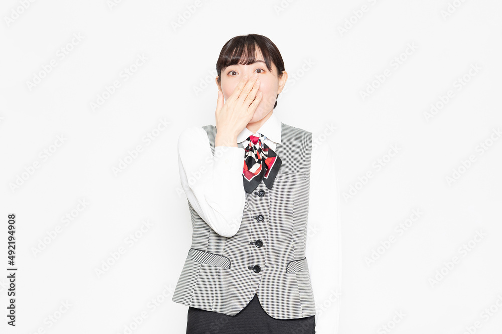 白い背景の前に立って驚いているビジネスウーマン 白い背景の前に立って驚いているビジネスウーマン
