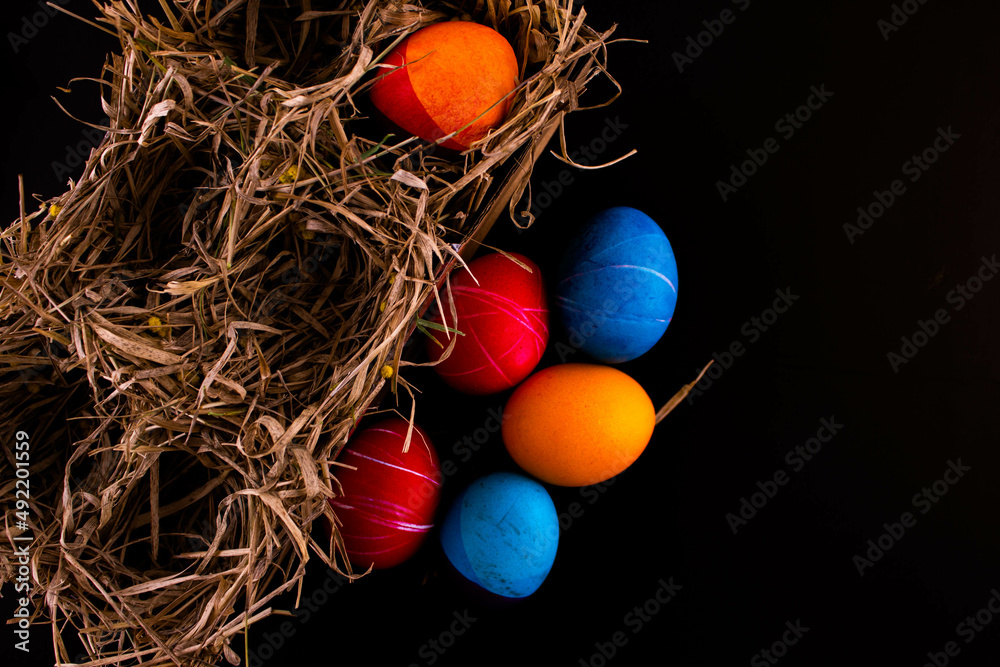 Easter eggs. Festive decoration. Easter. Celebration. Bright holiday. Eggs on a black background. Multi-colored eggs on a black background. Easter eggs. Festive decoration. Easter. Celebration. Bright holiday. Eggs on a black background. Multi-colored eggs on a black background.