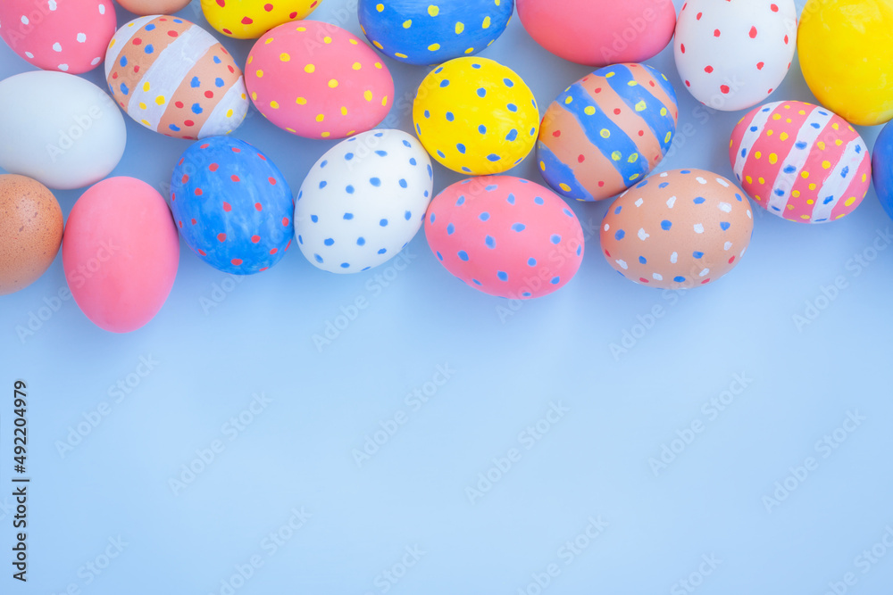 Colorful easter eggs on blue background