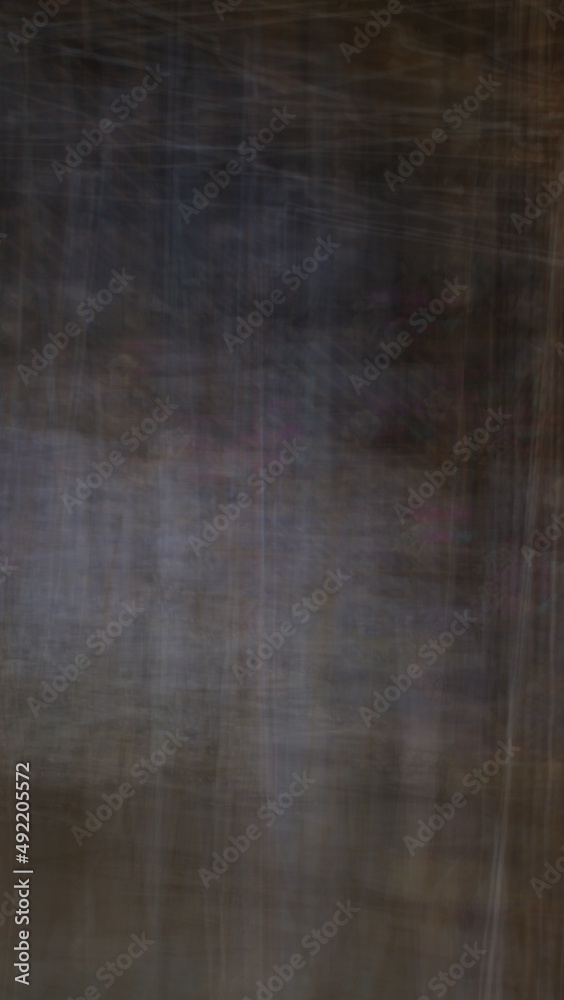 Abstract blur background with brown gray, black, white and earth tones.