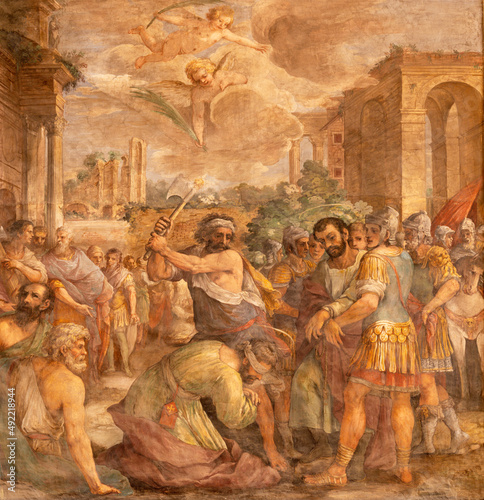 ROME, ITALY - AUGUST 30, 2021: The fresco of martyrdom of St. Cosmas and Damian in the church Basilica dei Sancti Cosma e Damiano by Francesco Allegrini (1587 – 1663). photo