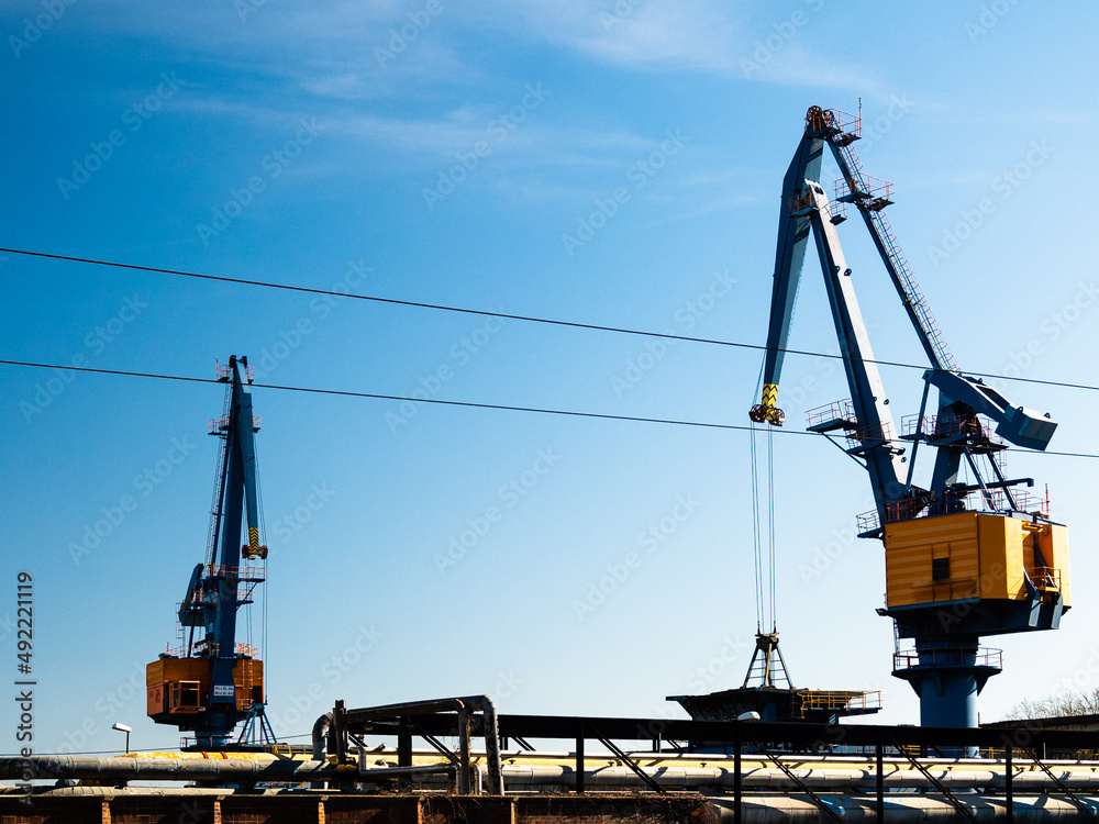 Port crane at a thermal power plant. Port crane at a thermal power plant.