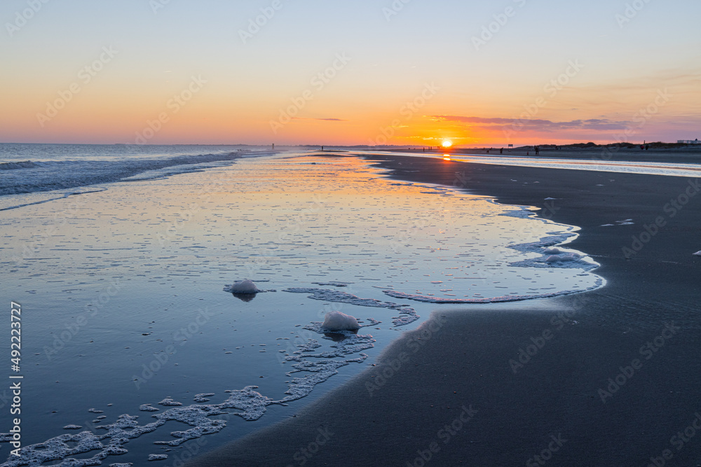 Sunset Over The Tidal Flats of Folly Beach, Folly Island, South Carolina, USA