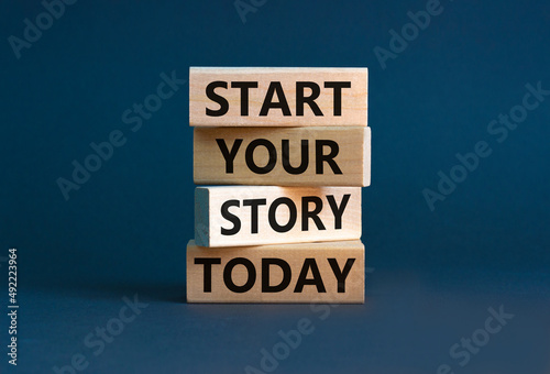 Start your story today symbol. Concept words Start your story today on wooden blocks. Beautiful grey table grey background. Start your story today business concept. Copy space.