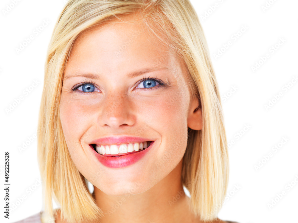 A charming smile. Gorgeous young blond woman smiling happily against a white background. A charming smile. Gorgeous young blond woman smiling happily against a white background.