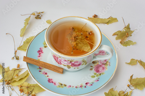 Linden tea in cup on white background.