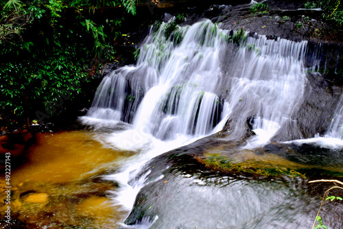 Fototapeta Naklejka Na Ścianę i Meble -  One-tiered waterfall in a natural source