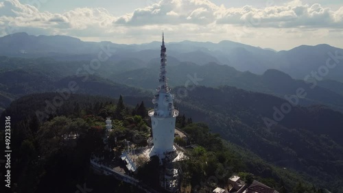 The most unusual temple. Tower with spiral staircase. Ambuluwawa Biodiversity Complex - The main attractions of Sri Lanka. Aerial 4K photo