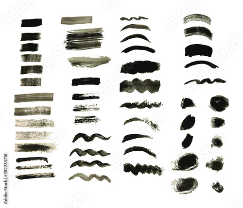 Vector collection of artistic grungy black paint hand made creative brush stroke set isolated on white background.