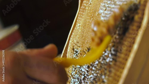 Wallpaper Mural The pores of the honeycomb are opened with a tool. Torontodigital.ca