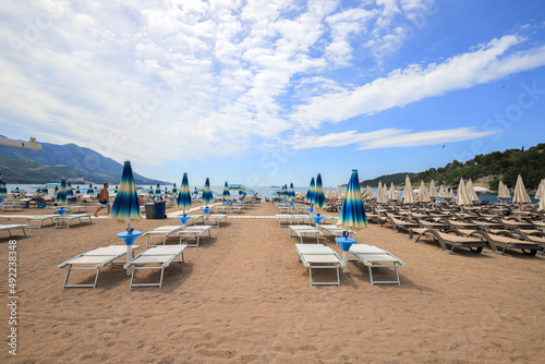 Beautiful beach with sunshades in Montenegro