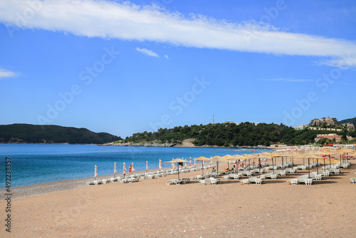 Beautiful beach with sunshades in Montenegro