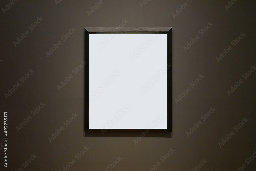 Blank picture frame mockup on black background