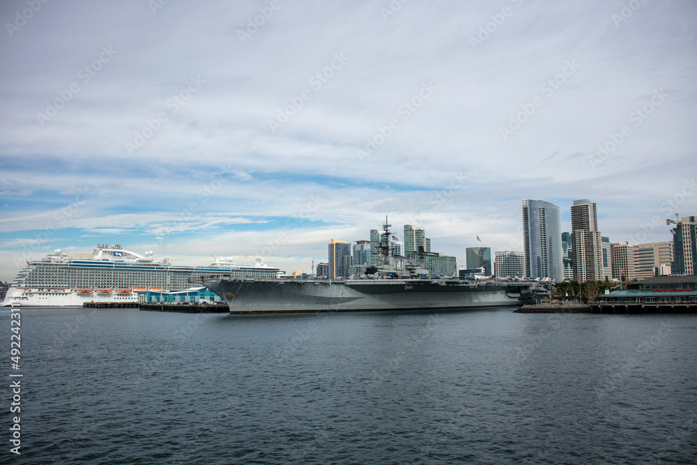 The San Diego, California, Embarcadero with the USS Midway Moored and the Downtown Skylin