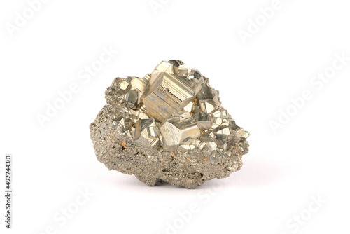 A close-up of Pyrite isolated on white. This mineral is also known as Fools Gold. 