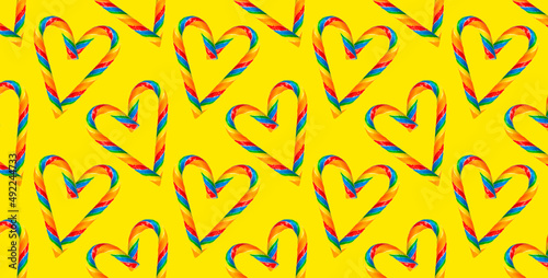 Seamless pattern sweet heart on a yellow background.