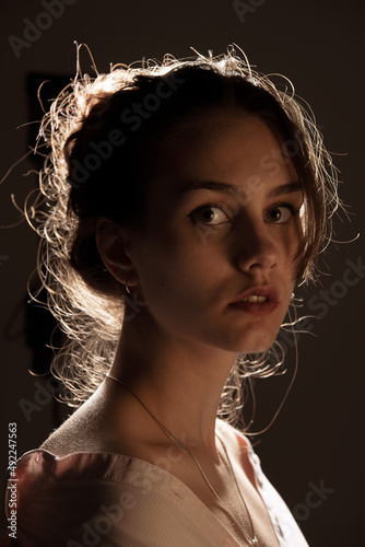 Beautifull woman portrait in warm light
