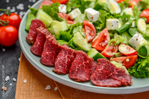 Vitello Tonnato, salad with veal carpaccio