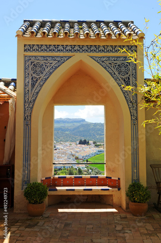 Balcón de Ronda. Balcón de arco apuntado decorado con azulejos moriscos con una vista espectacular de Ronda y las montañas que la rodean. Fin de semana romántico en Ronda Andalucía España photo