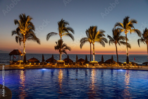 Tropical Beach Sunset with Beautiful Swimming Pool
